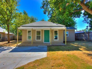 Bungalow-style house featuring cooling unit and a 