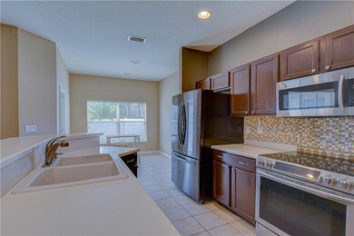 9638 Jasmine Brook Cir, Land O Lakes, FL 34638 - photo 5