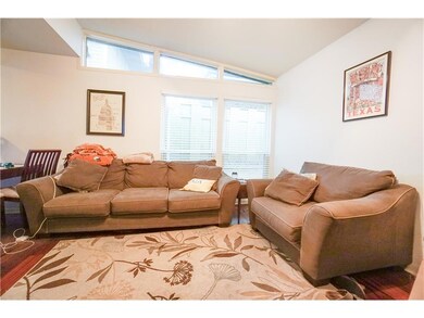 Living room with vaulted ceiling and wood finishe