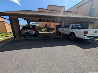 Carport with one covered and one open stall (tande