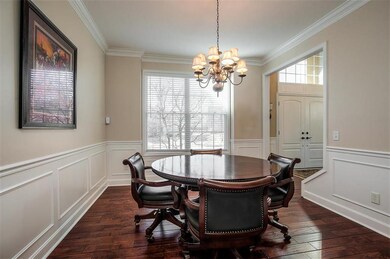 Large Formal Dining Room with wainscoting & gleami