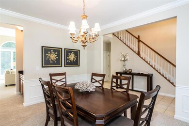 Dining room trimmed with wainscoting.