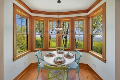 Dining area featuring hardwood / wood-style floors
