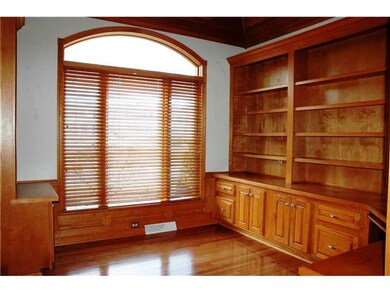 Den. Private den with bead board ceiling