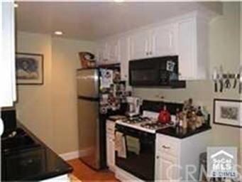 6600 Warner Ave unit 209, Huntington Beach, CA 92647 - photo 2