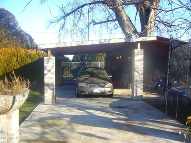 back yard  and carport