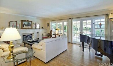 Formal living room with french doors, fireplace an
