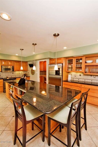Kitchen with large eating bar