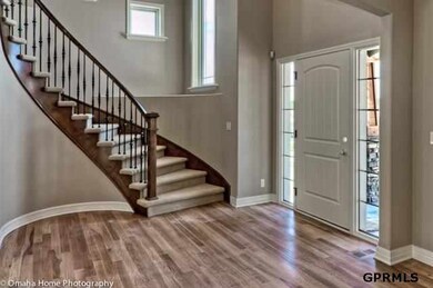 The photos attached to this listing are of a similar home.  This home is under construction and finishes may be similar but not the same
