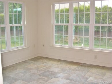 Sun Room w/Travertine Tile Floor; Patio off Sun Ro