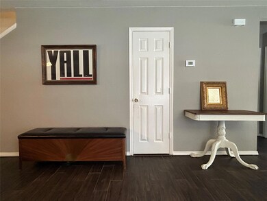 Door to Powder Room from Living Room
