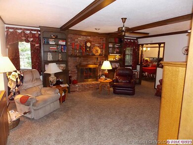 Spacious living area with wood burning fireplace,