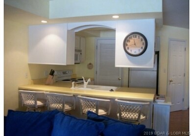 Kitchen with Breakfast Bar, Pantry and Utility Clo