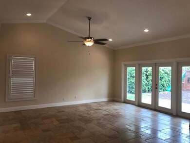Large Living Room with New French Doors leading to