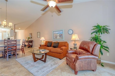 Living room featuring light tile patterned floors,
