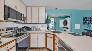 Kitchen featuring appliances with stainless steel 