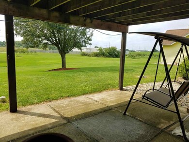 Lower level patio looking southeast.