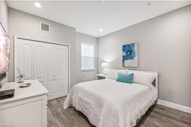 Bedroom featuring wood-type flooring and a closet