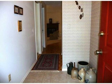 Foyer. Deep open foyer with new ceramic tile.
