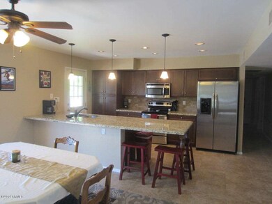 open kitchen and eat-in area