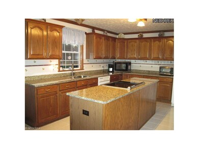 The large kitchen affords lots of work and storage