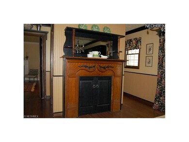 A highlight offered is the antique mantle which da