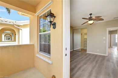 Entrance to property with ceiling fan