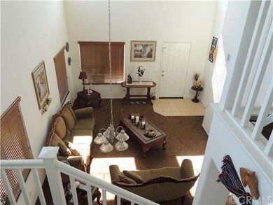 VIEW OF LIVING ROOM FROM SECOND FLOOR