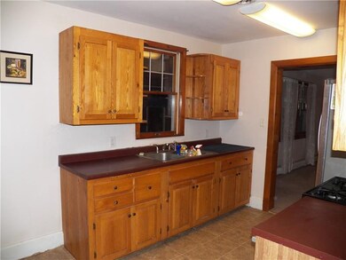Nice kitchen with lots of cabinets and counter spa