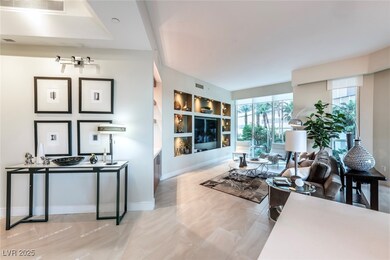 Living area with built in features and baseboards