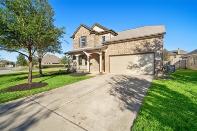 Beautiful landscaping, corner lot, and a classic porch!