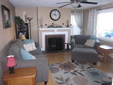 Living Room. Beautiful F/P living with hardwoods