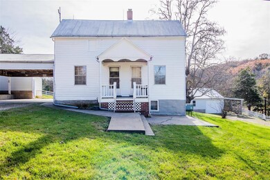 Front of house showing covered front porch.