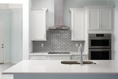 Large Kitchen Island with Upgraded Sink and Finishes