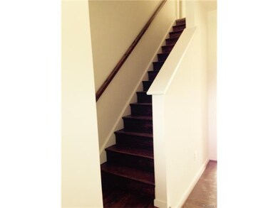 Foyer and Oaks stairs