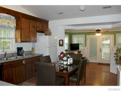 Huge kitchen/sunroom off the back of the house wit