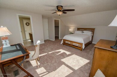 Master bedroom w/ access to master bath