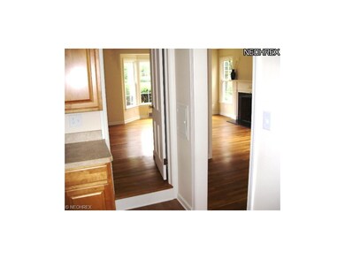 The kitchen leads to the dining room and the livin