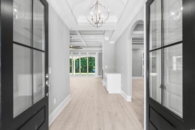 Entryway with beamed ceiling, ceiling fan with not