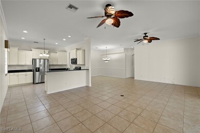 Kitchen featuring hanging light fixtures, ceiling