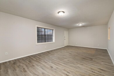 Empty room featuring hardwood / wood-style floors