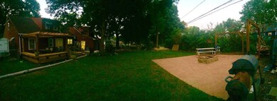 Backyard with fire pit, before shed was completed