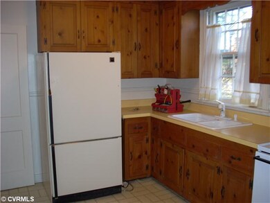 Kitchen - new stove, and enough space for a table 