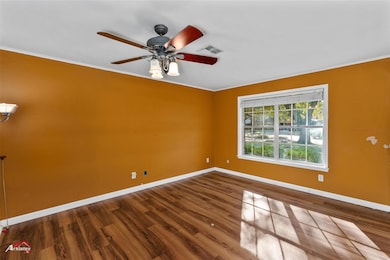Unfurnished room featuring crown molding, ceiling 