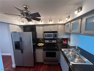 Kitchen featuring a sink, appliances with stainles