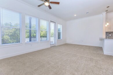 Large living/dining area with tons of natural ligh