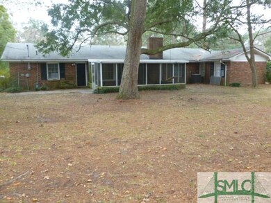 Back View of Home with Screened Porch.