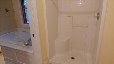 Guest bathroom adjoins master bath...