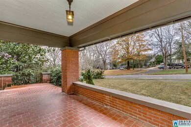 Wide front porch with tile floors and bead board c