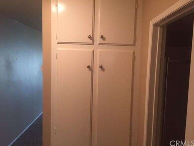 Entryway has extra storage for linens and more
